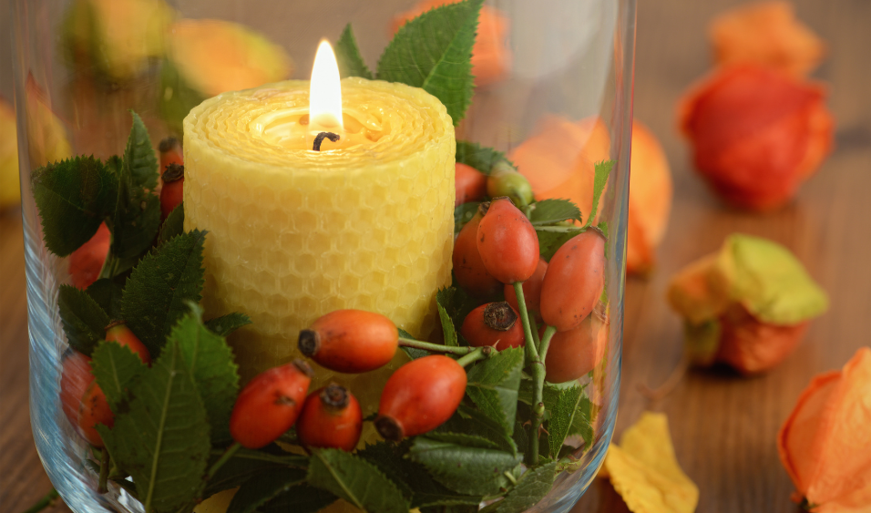 Creating a rustic festive table with rose hips and seasonal foliage